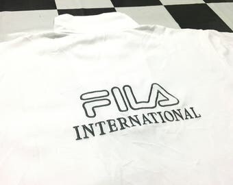 Vintage Fila half zip shirt embroidered spell out big logo Size L Fila international Good condition