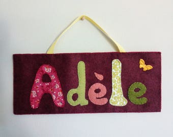 Door plate with felt and fabric
