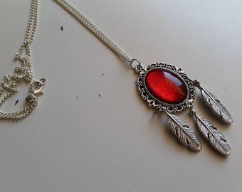 Necklace catches Red Oval dream