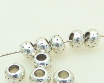 Set of 10 beads in silver metal engraved pattern