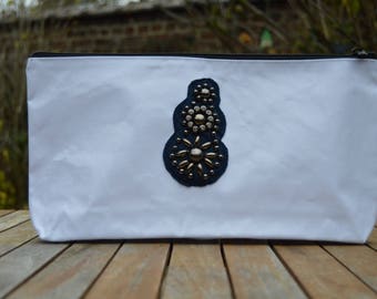 Pocket with decorative lace