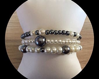Bracelet triple strand glass bead memory.