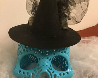 folding a tiny witch hat