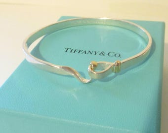 Tiffany & Co. 18Kt Yellow Gold and Sterling Silver Hook and Eye Bangle Bracelet