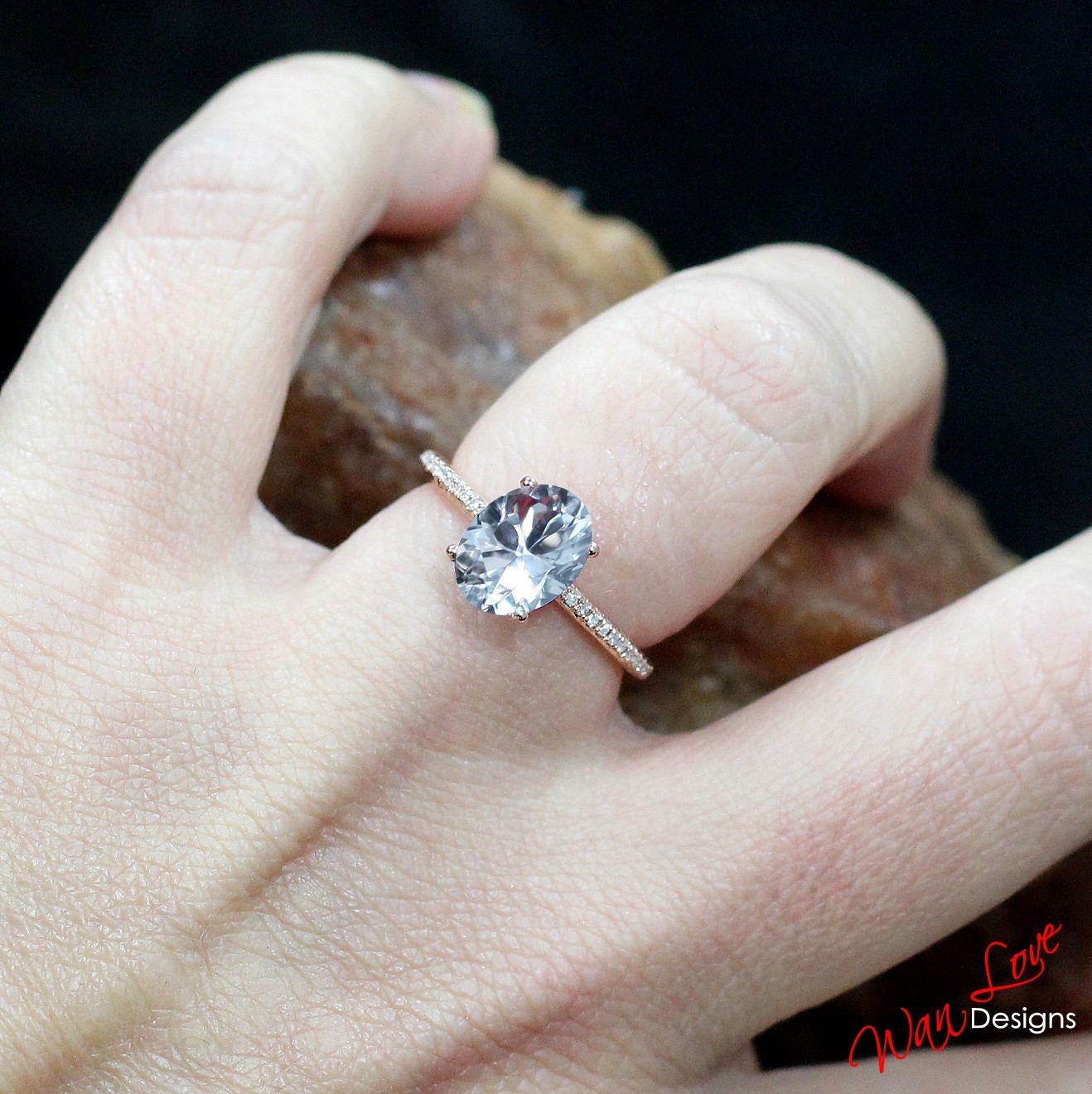 oval white sapphire engagement rings