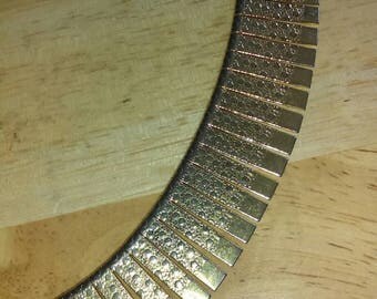 Vintage 1980s goldtone textured metal choker necklace