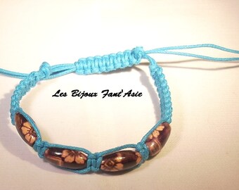 Dark purple wooden flower beads and turquoise macrame bracelet