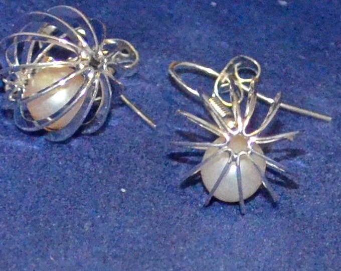 Pearls in a Cage, 7mm Round, not Drilled, Natural, Set in a Silver Plated Cage E1087