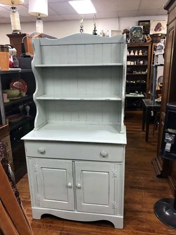 Kitchen Cabinet Hutch restyled a pale green