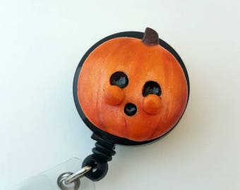 Spooky pumpkin Halloween badge reel