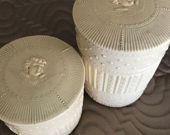Vintage pair of Cupid Celluloid Vanity Canisters