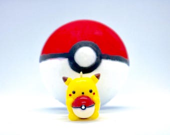 pikachu holding pokeball