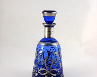 Decanter Cobalt Blue Glass, Silver Overlay Decorations, Flowers, and Leaves, Silver bands at neck and on stopper, Possibly Bohemian Vintage