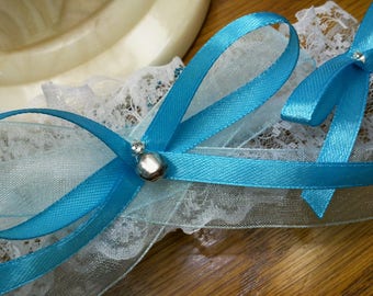 White and turquoise lace wedding garter