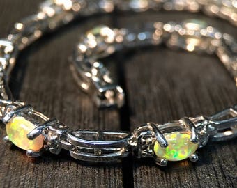 Silver Bracelet Marked 925 with Opal Like Stones #013