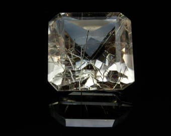 A bright sparkling rutilated quartz scissor cut ,24.5ct, 18x18x12mm