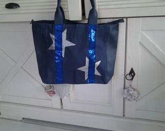 Bag has a star pattern with sequined band bag
