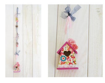 One decorative birdhouse in pink and grey