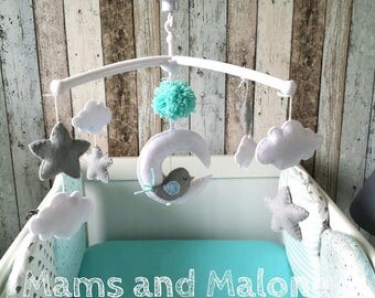 Musical baby mobile in felt, bird on the Moon and stars