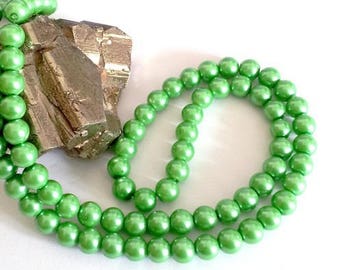 Wholesale lot of 100 Green Pearl glass beads, 8mm