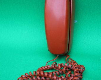VINTAGE orange rotary phone