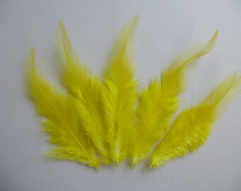 Yellow feathers. dyed rooster feathers. 3-4.5inches. 8-12cm. hat making, sewing, hair accessories