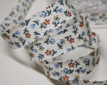 Sewing bias folded 2cm blue background and orange flower pattern cotton white (m) ref: BIAI06