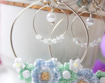 Hoop earrings with crystals and flowers
