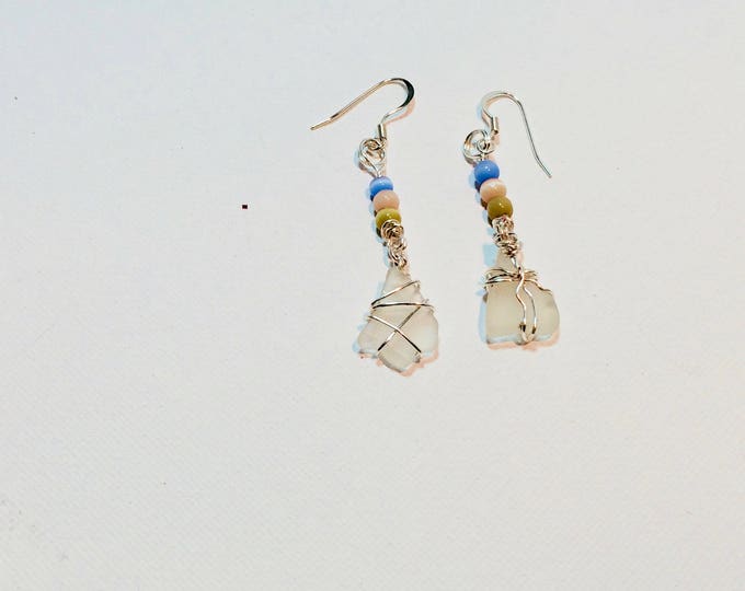 Cute tiny pieces of white beach glass with blue and tan beads earrings silver color wire wrap