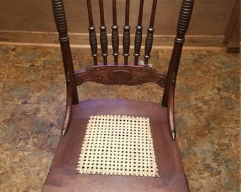 Antique chair with cane bottom