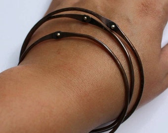 riveted bangle|copper bangle|copper bracelet|sterling rivet|copper and sterling|stacking bracelets|stacking bangles|rivets