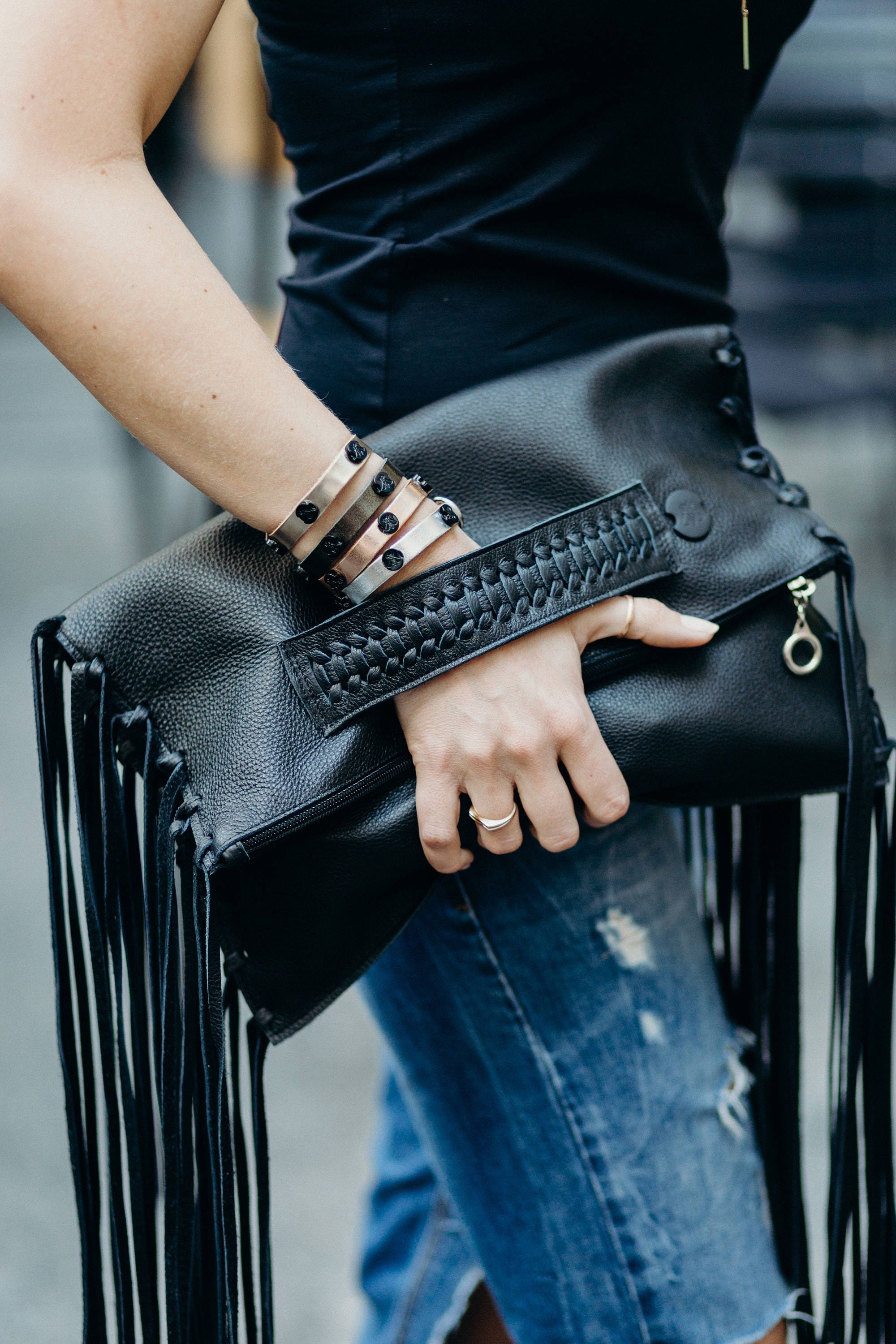 black fringe clutch bag