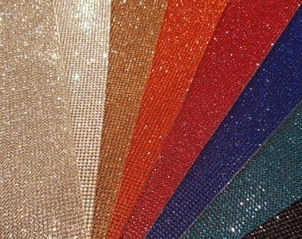 DMC Hotfix Rhinestone Sheets. HOT ITEM for Cheer bows and so much more!!! 9.25 X 15.5