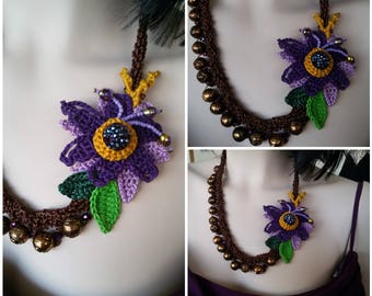 Floral romantic crochet necklace made with yarn candle.