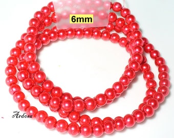 1 strand 82cm = 152 red glass beads 6 mm (806.21.1)