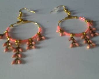Earring hoop coral on metal dore