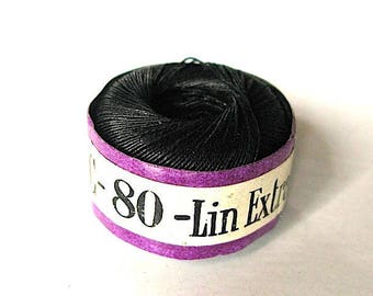 pretty roll of black linen thread.