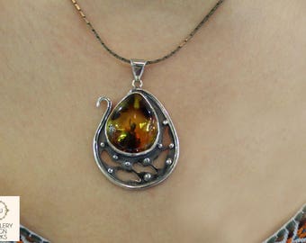 Silver Necklace decorated with Amber