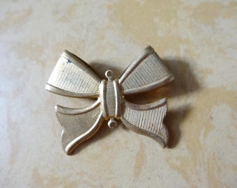 BRASS bow pendant