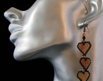 my creation is handmade earrings woven nine heart