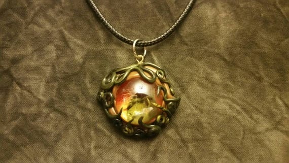 Items Similar To Snake Eye Pendant On Etsy