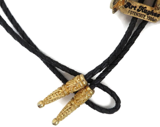 Vintage Black Bolo Tie - AAHMES 75 Years Potentate Bolo, Indian Headdress Pendant, Black Leather Tie, Unique Collector's Tie