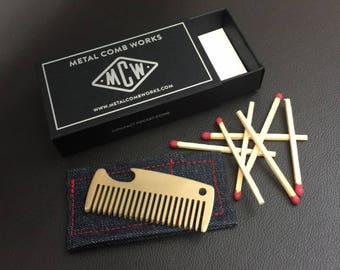 Compact metal pocket combs. Crafted to last a lifetime from brass or titanium. Excellent general purpose hair or beard comb. Made in USA.