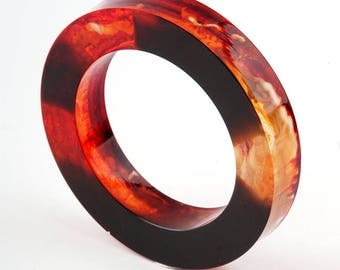 Bulky resin bangle, black and orange, diamater 2,51 in / 6,4 cm