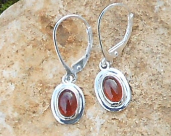 Stud earring, 925 sterling silver, hessonite Garnet size oval cabochon 7 x 5 mm