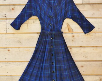 1950s plaid full pleated variation on a shirt-waist dress. Handmade