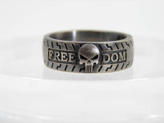 Hard knocks class ring. Custom biker ring featuring the Punisher with your engraving on either side. Perfect for that Harley Davidson biker.
