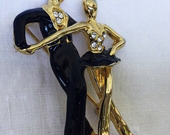 Ice skaters dancing couple pin
