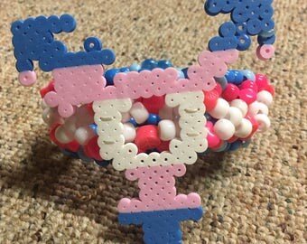 Pinkie Pie cuite mark perler on a DNA kandi cuff