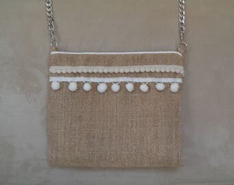 Jute bag has glitter and tassel